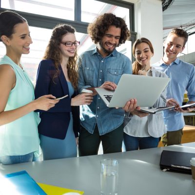 Products - smiling business team discussing over laptop in meeting p8u0dasvd7kcl03vmzl1x4dn1vqz9hxdwq801v91nk